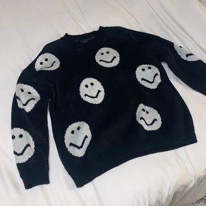 Black smiley sweater